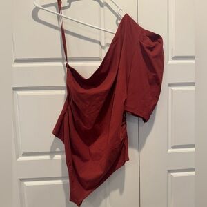 Asymmetrical maroon bodysuit, never worn